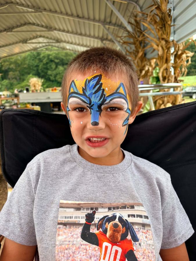 Boy with a blue wolf mask full face design, face painting by In His Image, Morristown TN