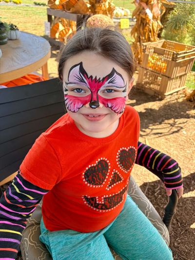 Girl with a pink fox full face design, face painting by In His Image, Morristown TN